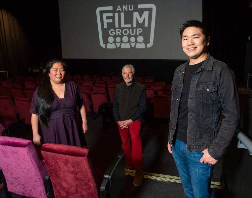 ANU Film Group members Kellie Takenaka and Brett Yeats with president Adrian Ma await a green light from the government and ANU to resume screenings. Picture: Elesa Kurtz 