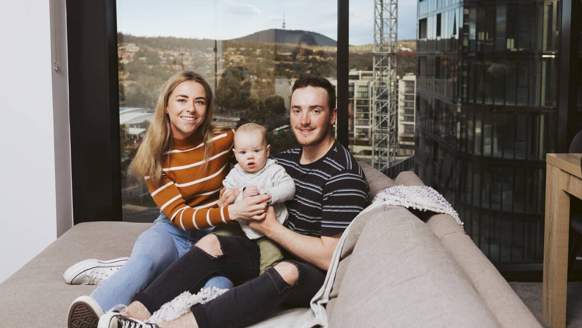Emma Deighton and Jayden Hatley with their 10-month old baby Jet Hatley, own an apartment at the Republic in Belconnen. Picture: Jamila Toderas 