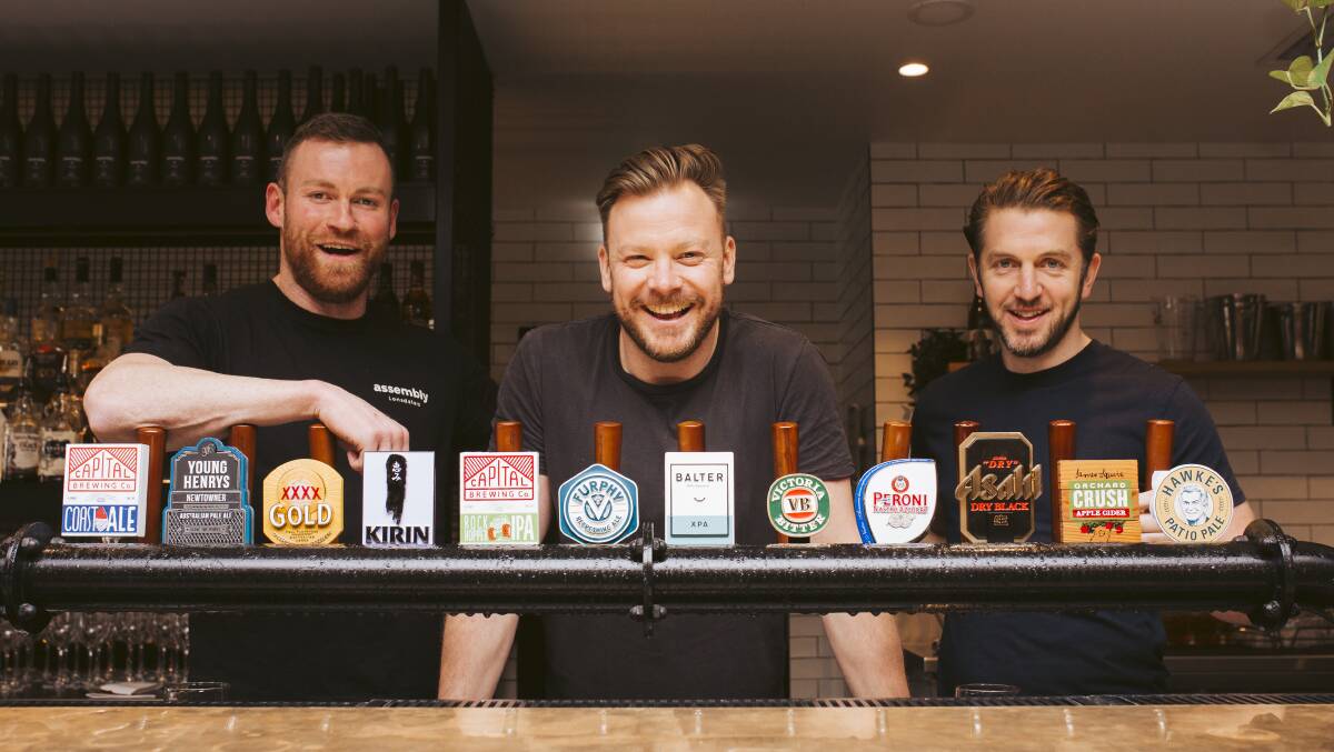 Assembly bar in Braddon say they're ready for customers once again. From left, manager Jack Ryan, owner Wes Heincke and manager Max Owens. Picture: Jamila Toderas