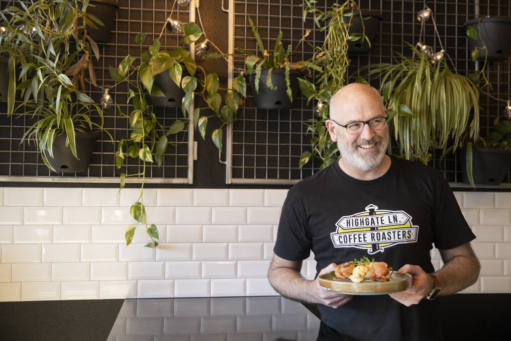 Bittersweet Cafe's Dan Rayner with some eggs benedict, made from ethically-sourced produce. Picture: Sitthixay Ditthavong