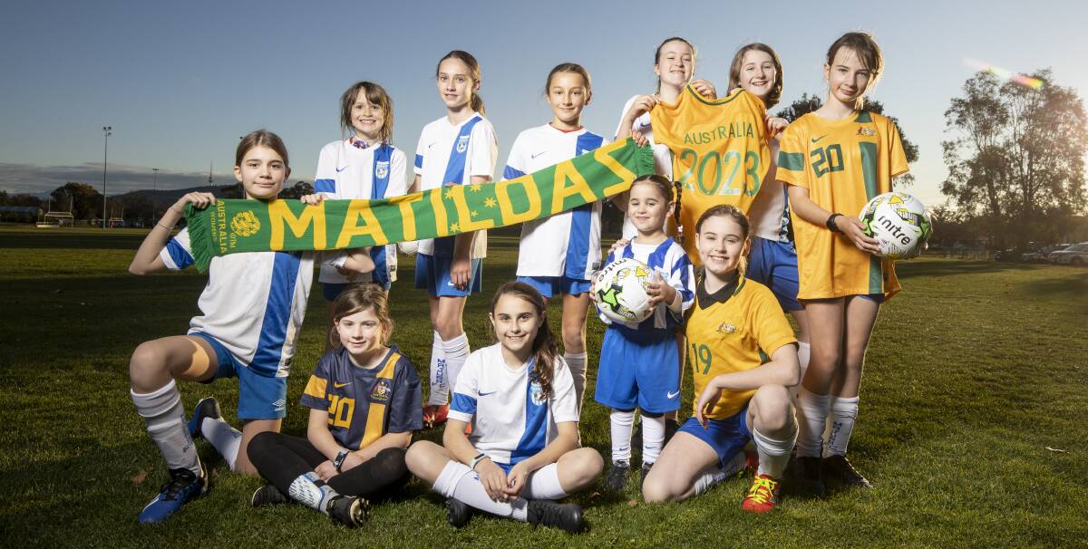 Players from Majura Football Club are looking forward to Australia hosting the Women's World Cup. Front: Millie Pellegrino, Lily Reid, Abbie Senese, Amalia Zaris, and Isla Farrell. Standing: Zoe Schofield, Isabella Devine, Radha Tynan-Foster, Lulu Schofield, Amy Love and Hannah Reid. Picture: Sitthixay Ditthavong