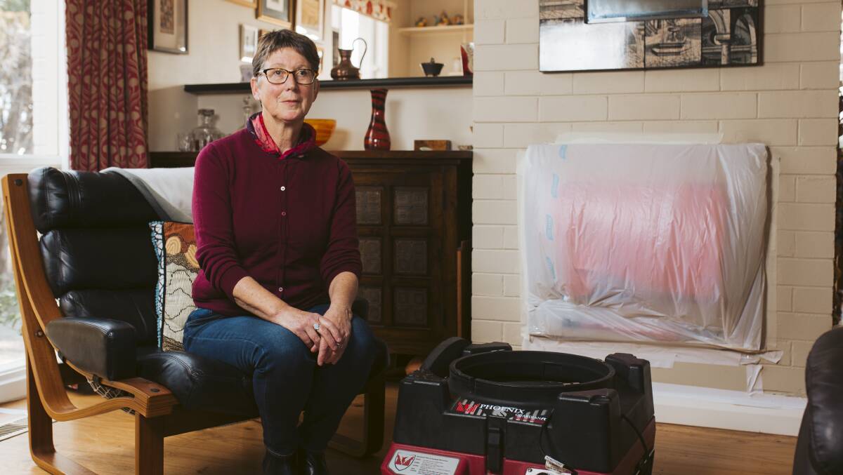 Michelle Weston, who has asthma is taking extra measures to prevent smoke from entering her house from neighbours wood-fired heaters. Picture: Jamila Toderas