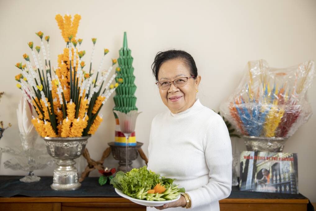 Chanla Khanthavongsa at home with fresh produce from her garden. Picture: Sitthixay Ditthavong