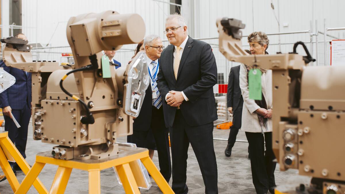 Prime Minister Scott Morrison visits Electro Optics Systems in Canberra earlier this year. Defence manufacturing is set to get a boost in next week's budget. Picture: Jamila Toderas