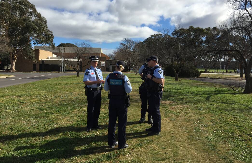 The head of the ACT police COVID task force, Superintendent Jason Kennedy, briefs his team members