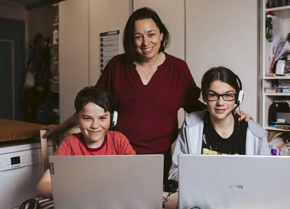 Elizabeth Hickey, with sons Anthony, 12, left, and Freddie, 13, who have been tutored online. Picture: Jamila Toderas