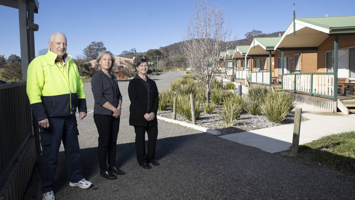 Canberra Carotel caretaker Bob Fearn, manager Frances Egan-Richards, and receptionist Rebecca Bell, who say the business has been hit hard by the lack of large school groups visiting Canberra due to coronavirus. Picture: Sitthixay Ditthavong 