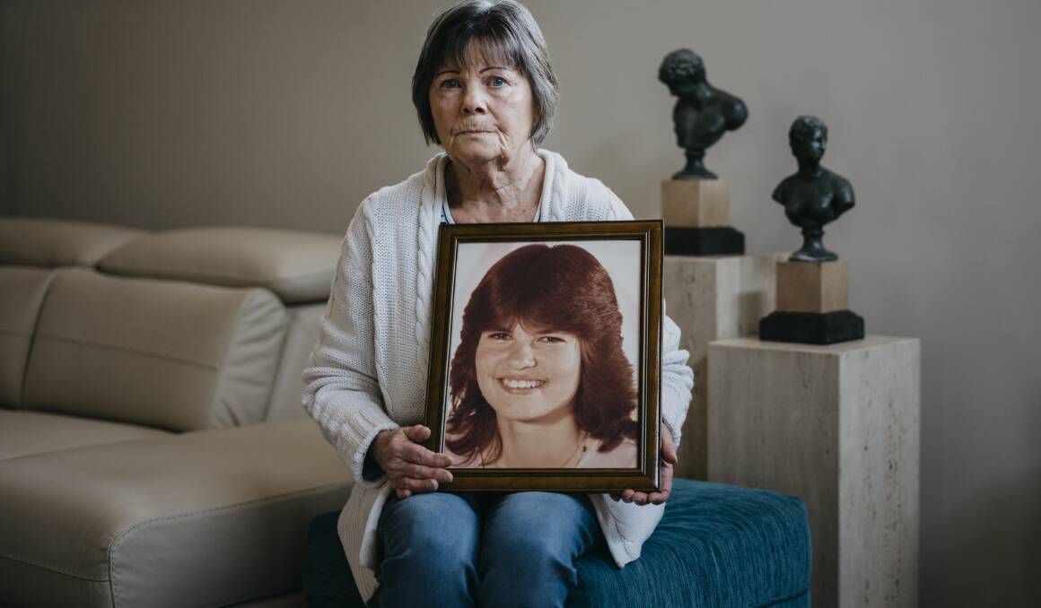 Dorothy Mulquiney with a portrait of her missing daughter Megan. Picture: Dion Georgopoulos