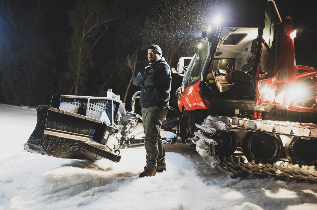 Snow cat operator Jeremy Blake works through the night at Thredbo Alpine Resort. Picture: Dion Georgopoulos