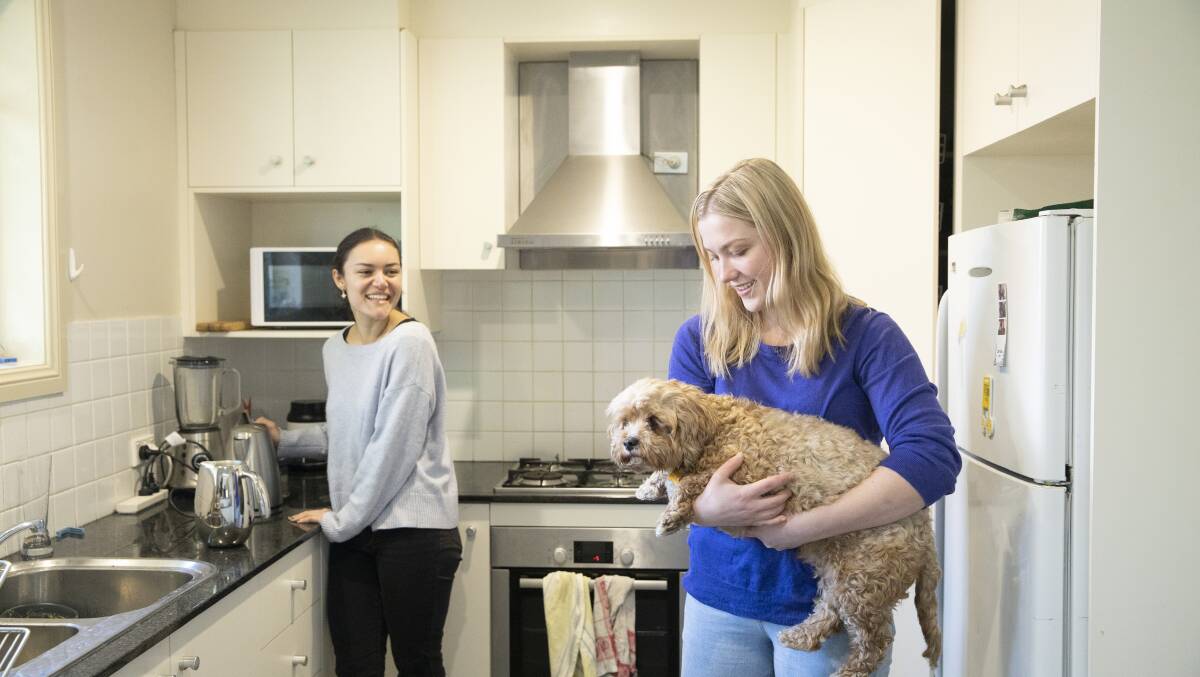 Kate Western and Charlotte Goodman appreciate any savings they can make off energy bills. Picture: Sitthixay Ditthavong