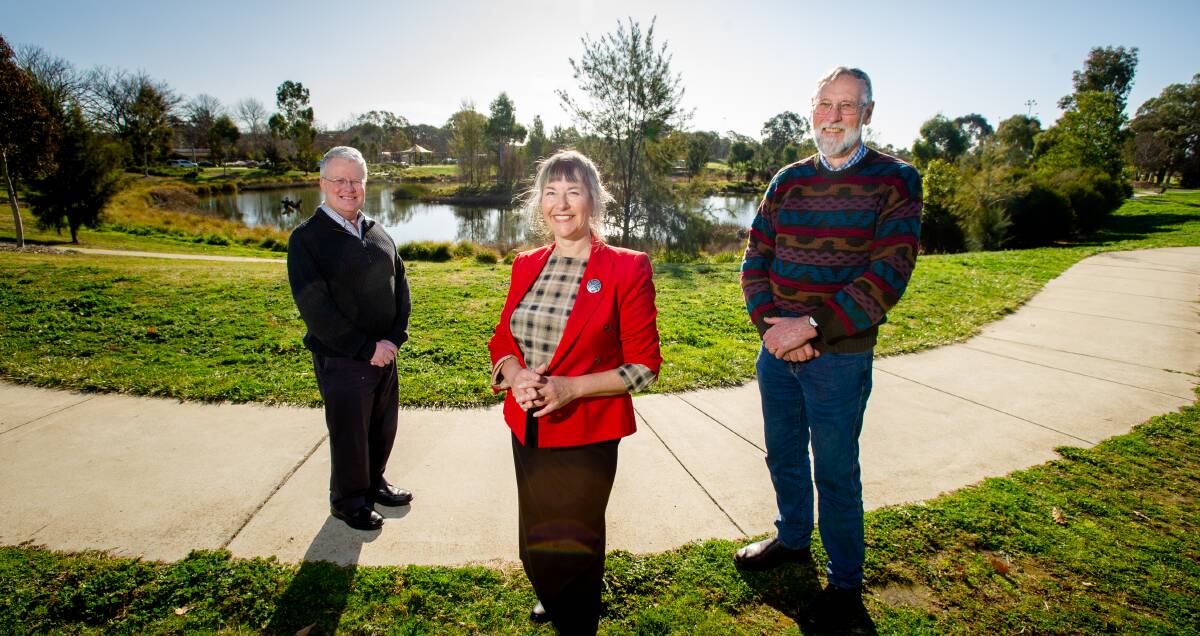 President of National Trust ACT Gary Kent, Jane Goffman and Canberra and District Historical Society president Nick Swain on the site of the aerodrome this week. Picture: Elesa Kurtz