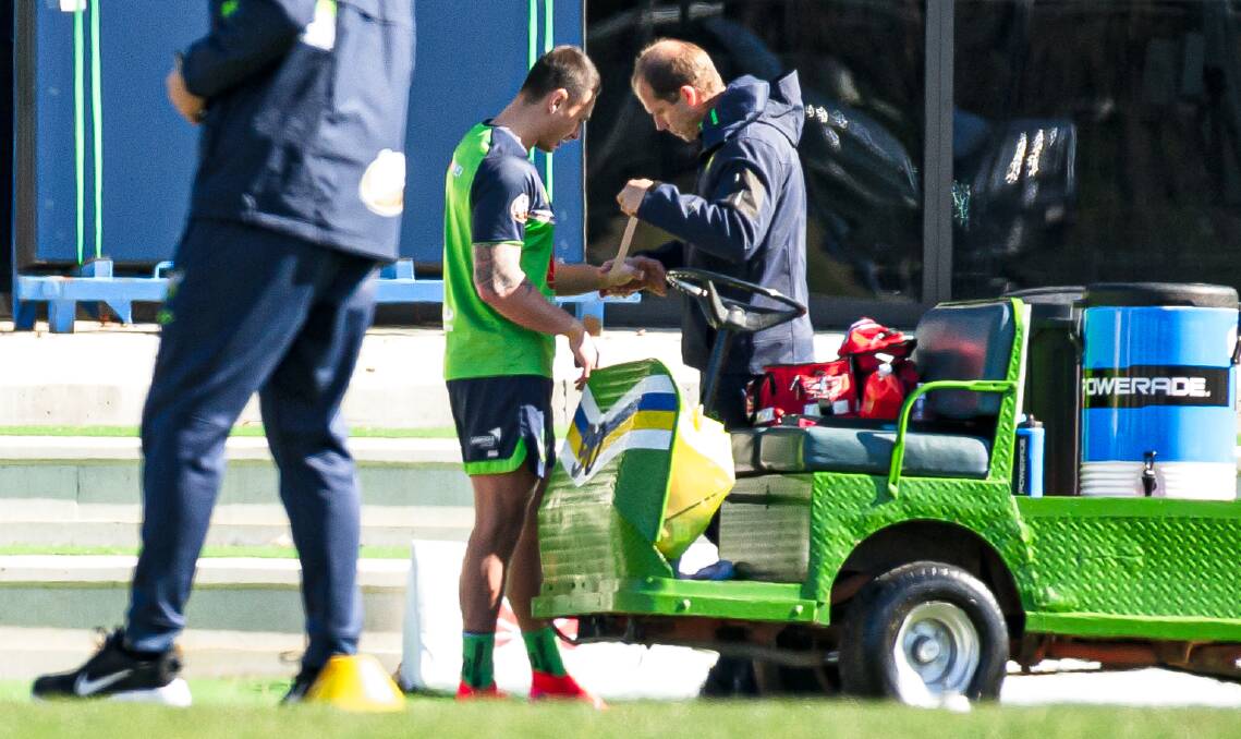Raiders fullback Charnze Nicoll-Klokstad gets some strapping on the left hand he injured against South Sydney. Picture: Elesa Kurtz