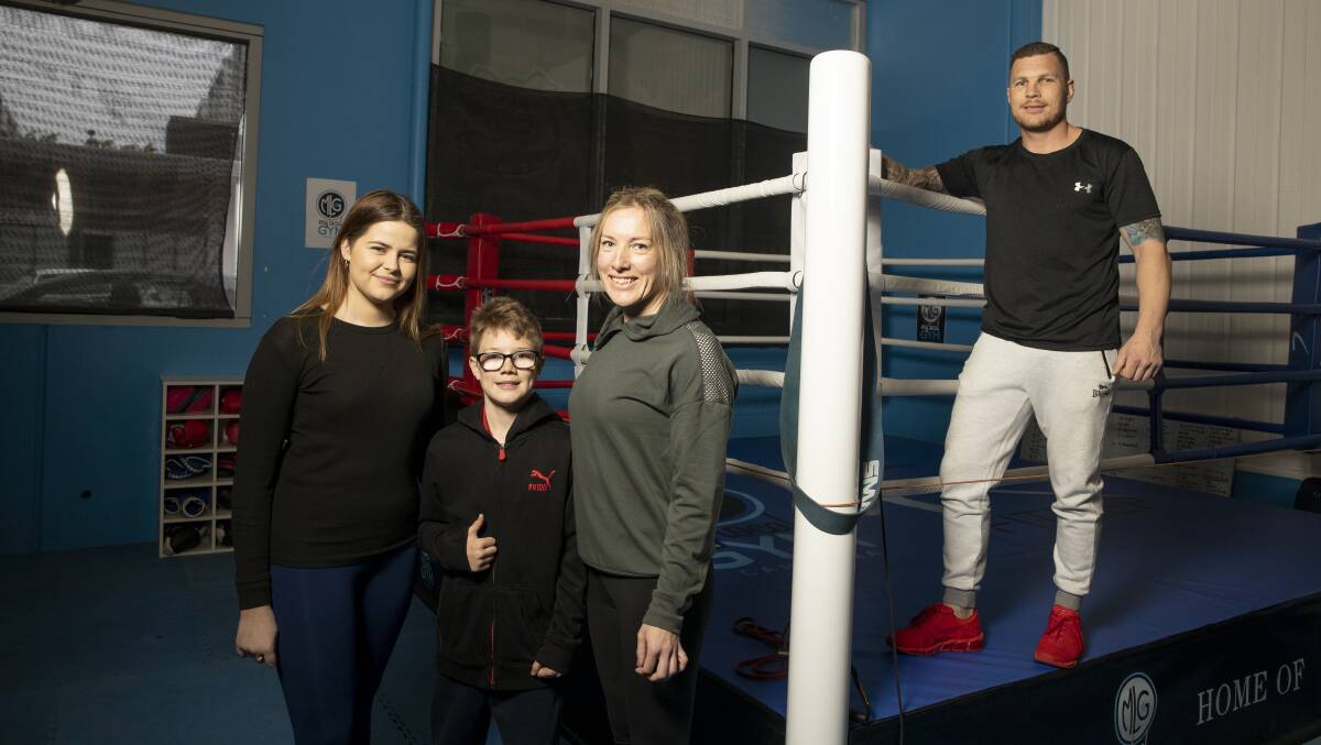Caitlin, Kobi, and Jakelin Verran, with Benjamin Reid inside Bulldog Gym ahead of its launch on Monday. Picture: Sitthixay Ditthavong