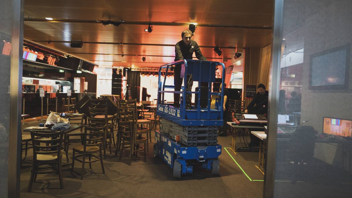 Head of audio Petar Milinkovic at the Canberra Theatre Centre setting up for their first live audiences in months as COVID-19 restrictions ease. Picture: Dion Georgopoulos