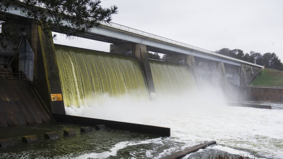 Floodgates are open at Scrivener Dam as rainfall fills Lake Burley Griffin. Picture: Dion Georgopoulos