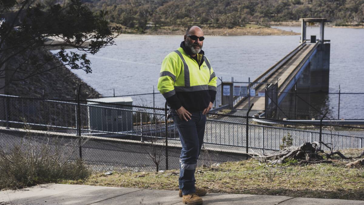 Joe Zahra, headworks operator for Icon Water, at Googong Dam on Monday after rain filled Canberra's dams on the weekend. Picture: Dion Georgopoulos