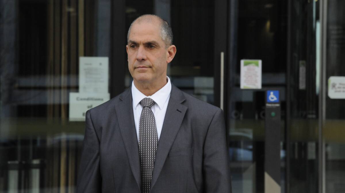 Former Australian Federal Police deputy commissioner Ramzi Jabbour leaves the ACT Magistrates Court on Monday. Picture: Blake Foden