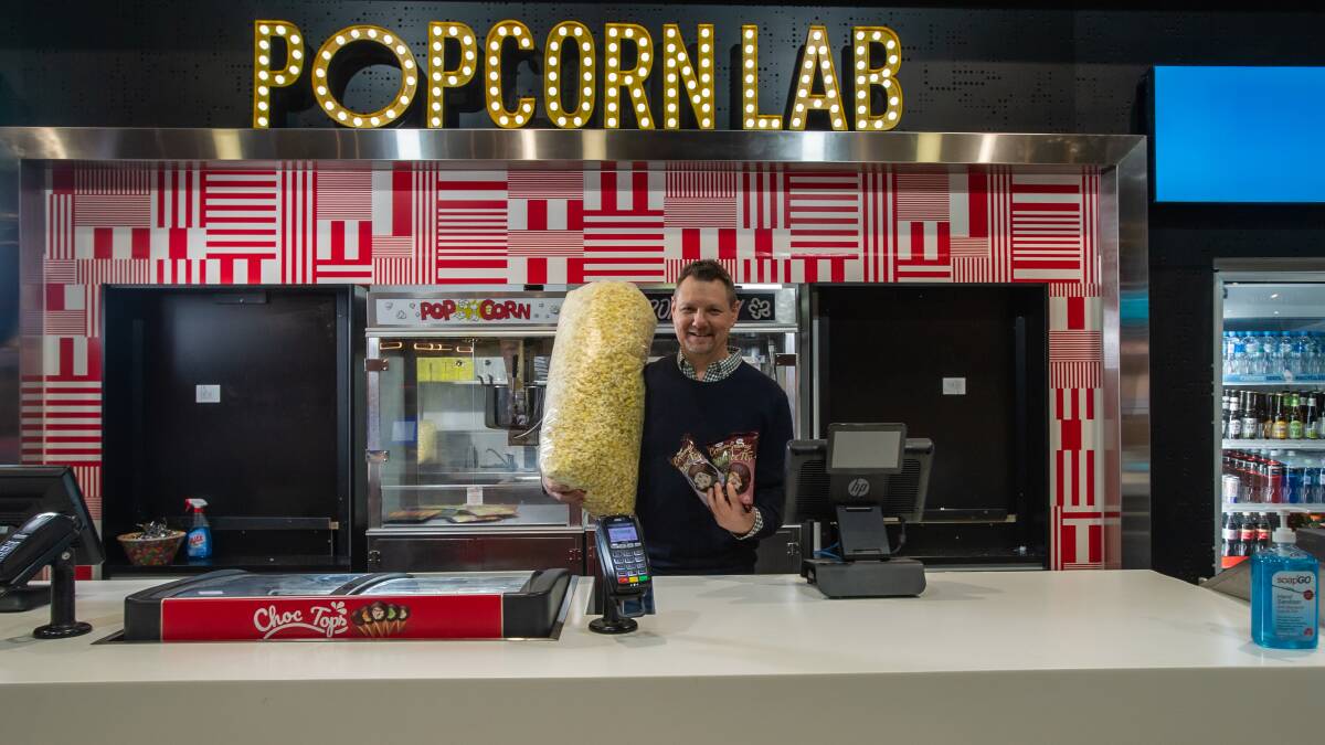 Limelight Cinema owner Ross Entwistle in the Popcorn Lab where patrons can load their popcorn with lollies and chocolate. Picture: Karleen Minney
