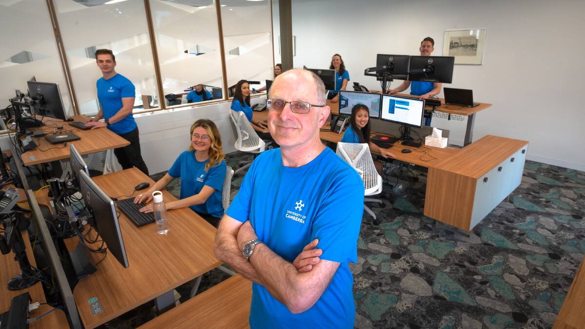 Professor Geoff Crisp and University of Canberra student ambassadors prepare for the virtual open day to work around COVID-19 restrictions. Picture: Elesa Kurtz