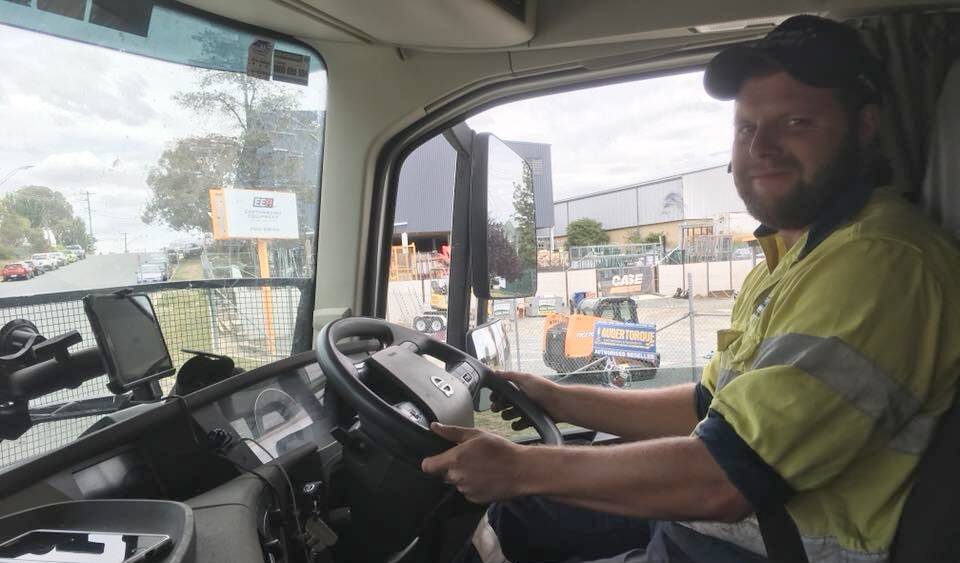 Brett Hartley-Kennett behind the wheel of a truck. Picture: Facebook