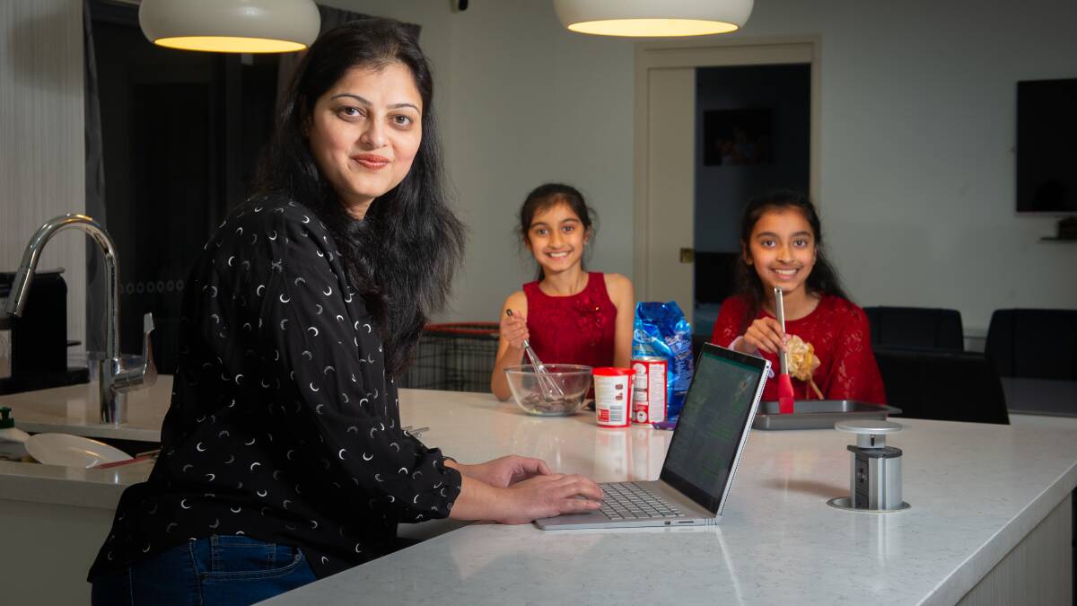 Rachana Chitre, with her daughters, Samaira 8 and Sara Venkat, 10, has juggled parenting and a business during COVID-19. Picture: Elesa Kurtz
