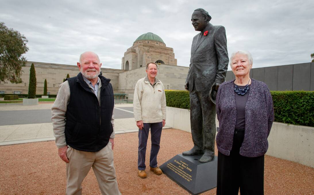 From left: Greg Coombs, Andrew Donaldson and Anne Buttsworth with the statue of Sir Edward "Weary" Dunlop on Friday. Picture: Elesa Kurtz