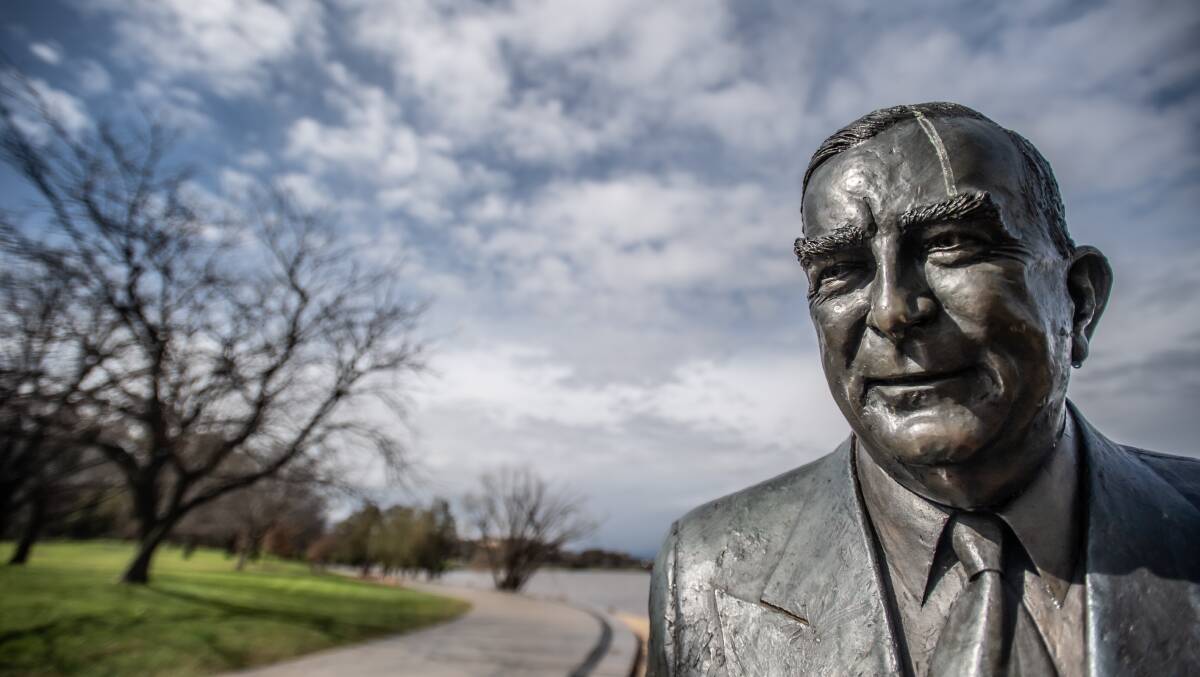Australia's longest-serving prime minister and Liberal party founder Robert Menzies is depicted in a statue next to Lake Burley Griffin. Picture: Karleen Minney