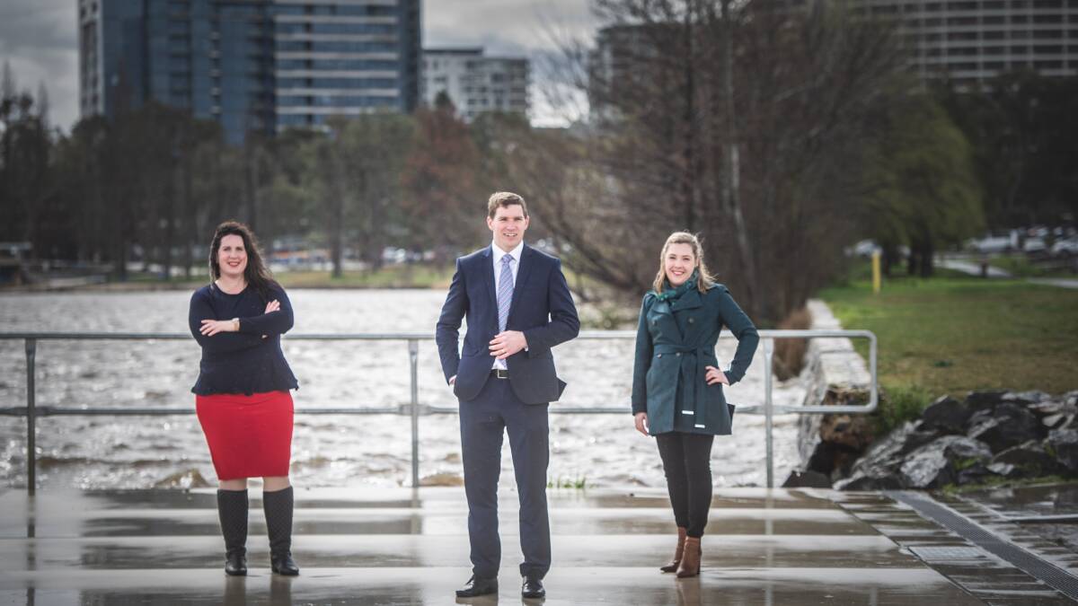Canberra Liberals Giulia Jones, Alistair Coe and Candice Burch have promised to reverse the Curtin horse paddocks land-swap. Picture: Karleen Minney