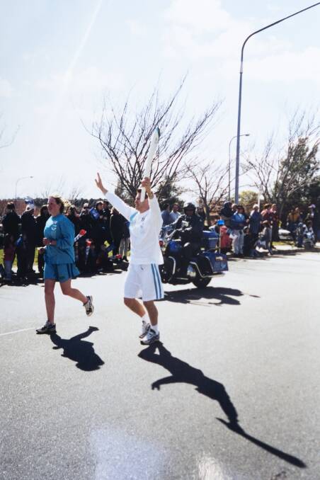 Brennon Dowrick running the relay on John Cleland Crescent Canberra in Florey. Picture: Supplied