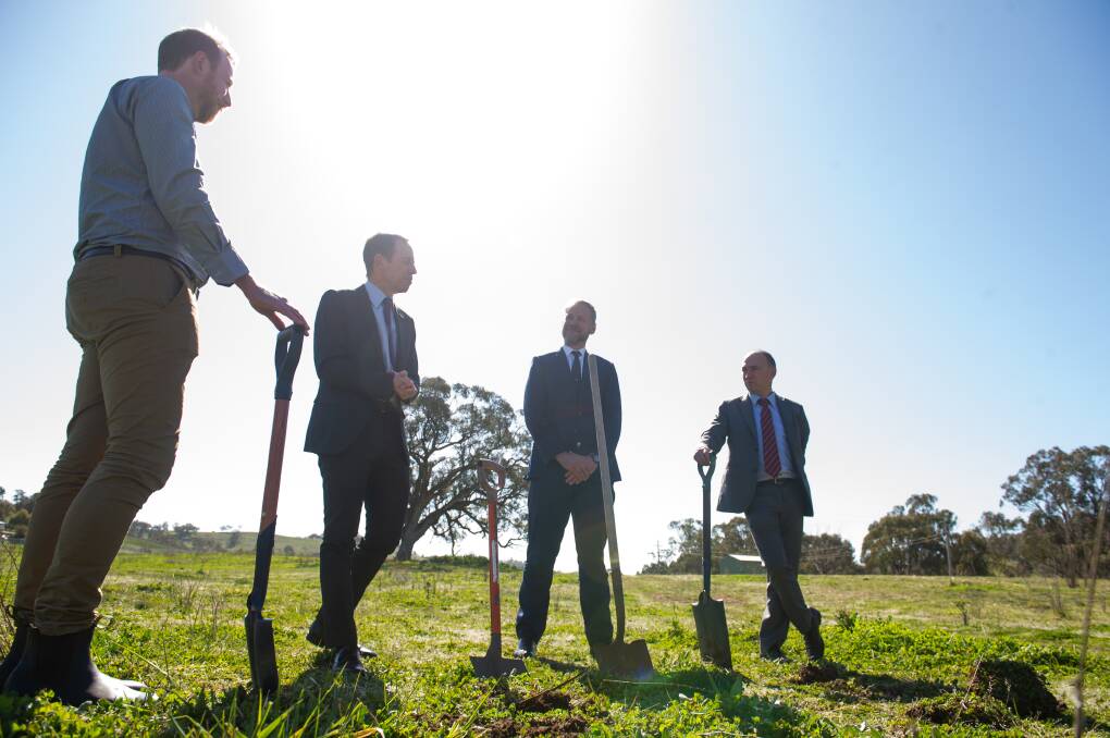 SolarShare founder Lawrence McIntosh, ACT Climate Change Minister Shane Rattenbury, CWP Renewables chief Jason Willoughby and SolarShare chairman Nick Fejer ready to turn the first sod of Canberra's first community-owned solar farm. Picture: Elesa Kurtz