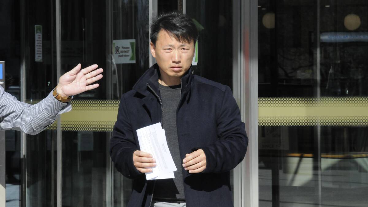Kenny Choi leaves the ACT Magistrates Court on Tuesday after he was granted bail. Picture: Blake Foden
