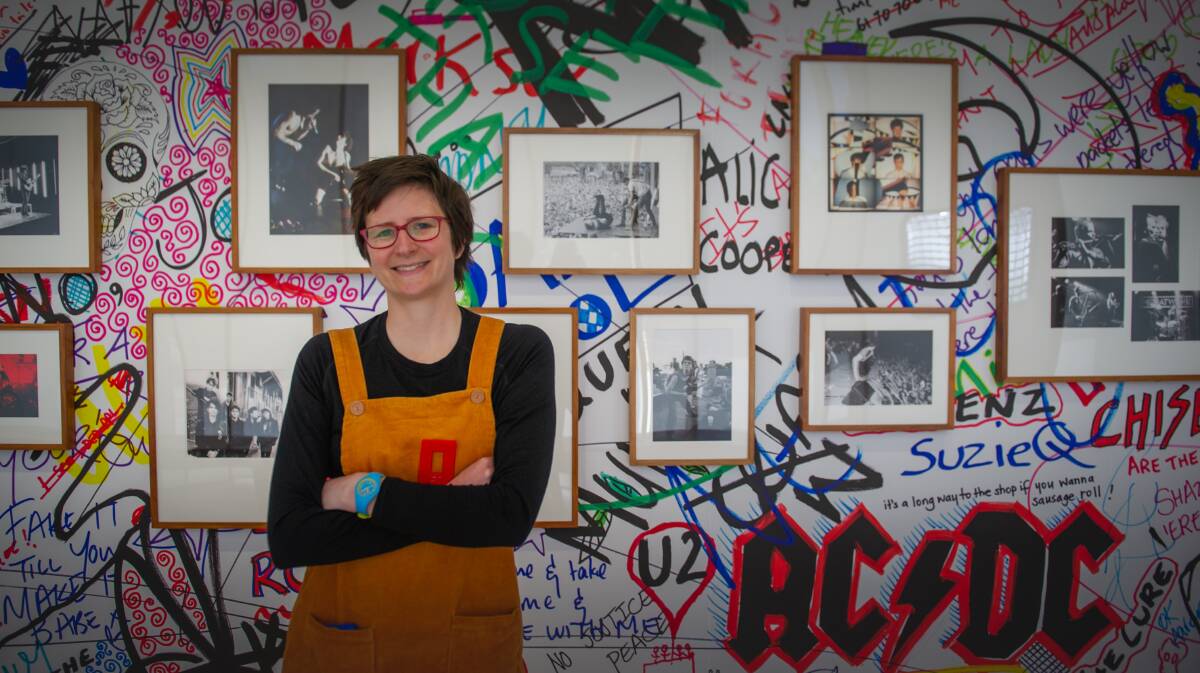 National Portrait Gallery curator Penny Grist in the new exhibition Pub Rock. Picture: Karleen Minney