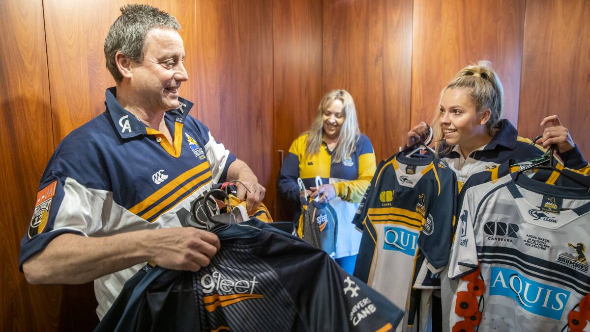Brumbies fan Jim Taylor, wife Jody and daughter Beth will be in the stands for the decider. Picture: Sitthixay Ditthavong