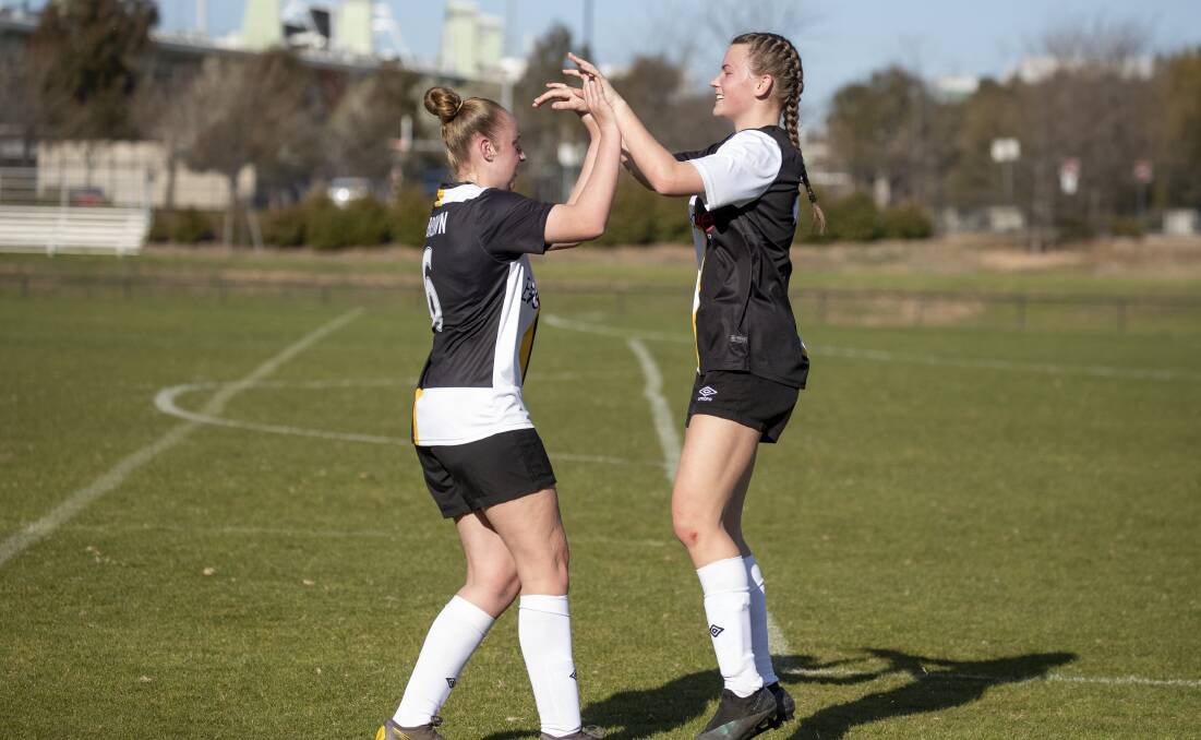 Ella-Rose Brown congratulates a delighted Jade Brown after she scored Gungahlin United's second goal. Picture: Sitthixay Ditthavong