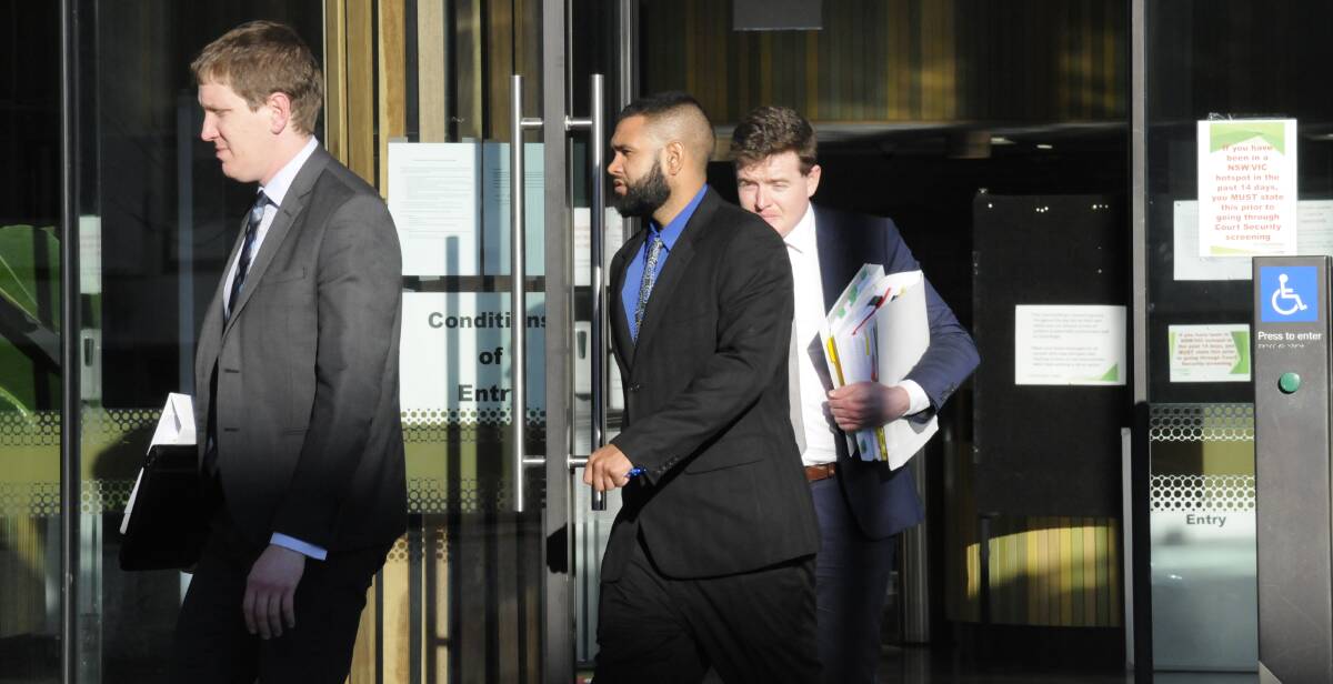 Kerrod Edwards, centre, leaves the ACT Supreme Court with his lawyers during his trial. Picture: Blake Foden