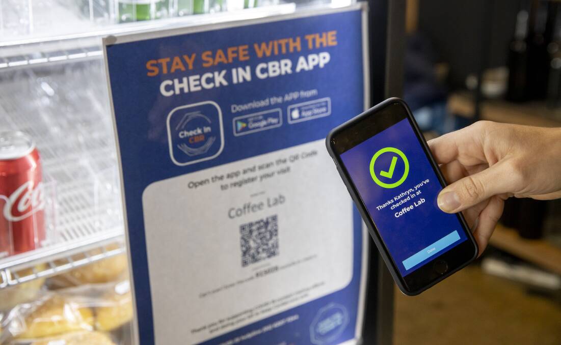 The Check In CBR app will collect names and numbers only for contact tracing purposes, and will purge the data 28 days after it was collected. Picture: Sitthixay Ditthavong