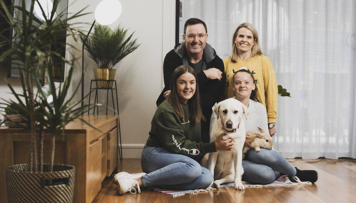 The team behind the coach: Brumbies mentor Dan McKellar, wife Carla, and daughters Amelie and Maya. Picture: Dion Georgopoulos
