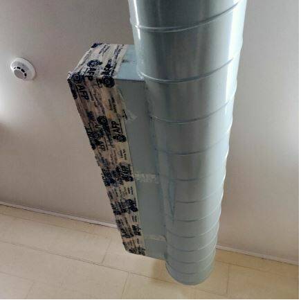Police evidence tape is used to jury-rig a seal on water leaking from a vent at the ACT Traffic Operations Centre.