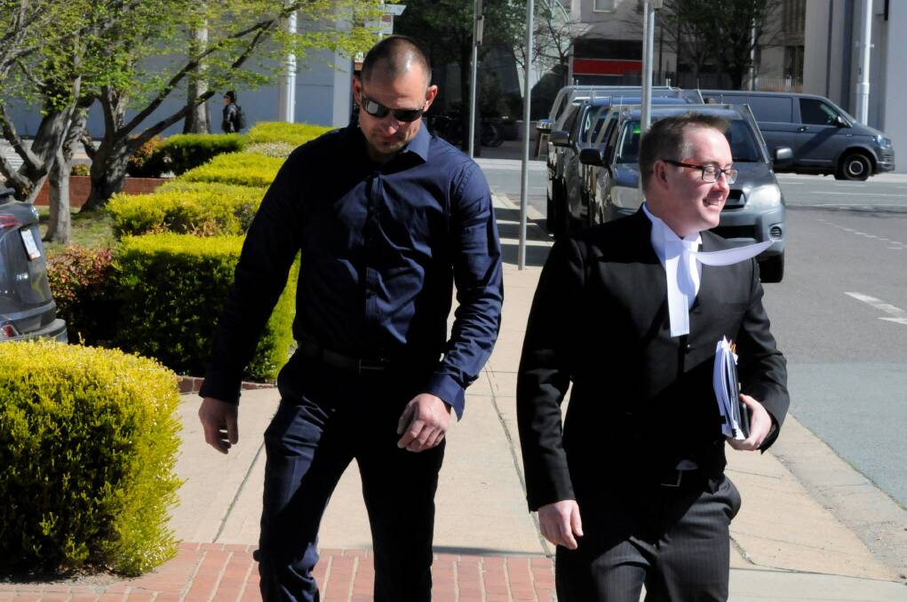 Former Canberra Comanchero commander Peter Zdravkovic, left, arrives at the ACT Supreme Court with barrister Jason Moffett on Wednesday. Picture: Blake Foden