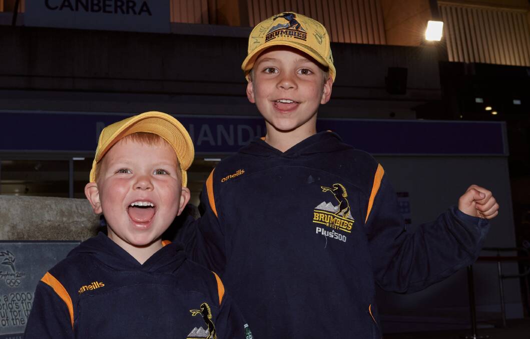 Brumbies fans, Josh, 3 and Chase, 5, from Curtin were fired up before the grand final tonight. Picture: Matt Loxton
