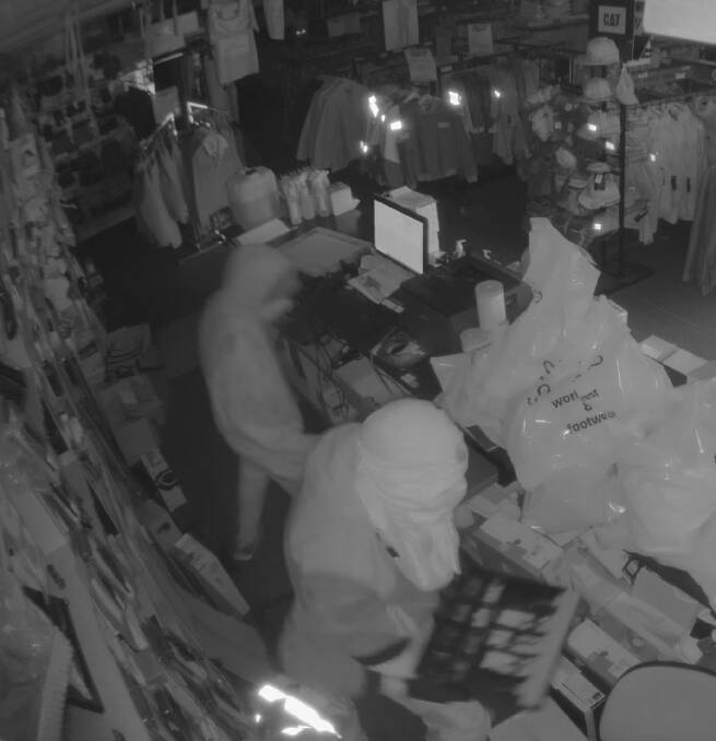 Snapshot from security vision with offenders stealing the cash float from a Fyshwick business on Sunday morning.
