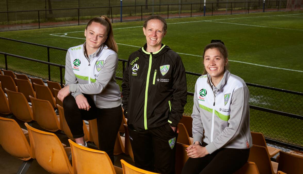 New signings, Hayley Taylor-Young, with Canberra United Coach, Vicki Linton, and Rachael Goldstein at Deakin Stadium. Picture: Matt Loxton