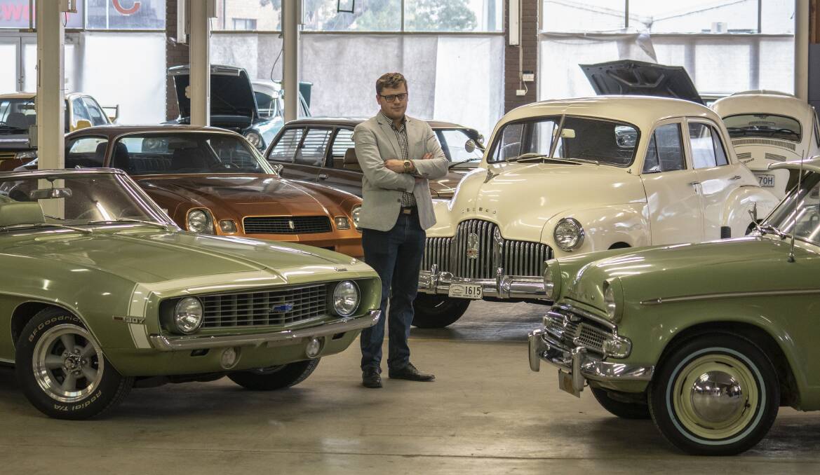 Ben Hastings with some the rare, unusual and classic local cars that have gone under the hammer at Allbids. Picture: Tim Jessop