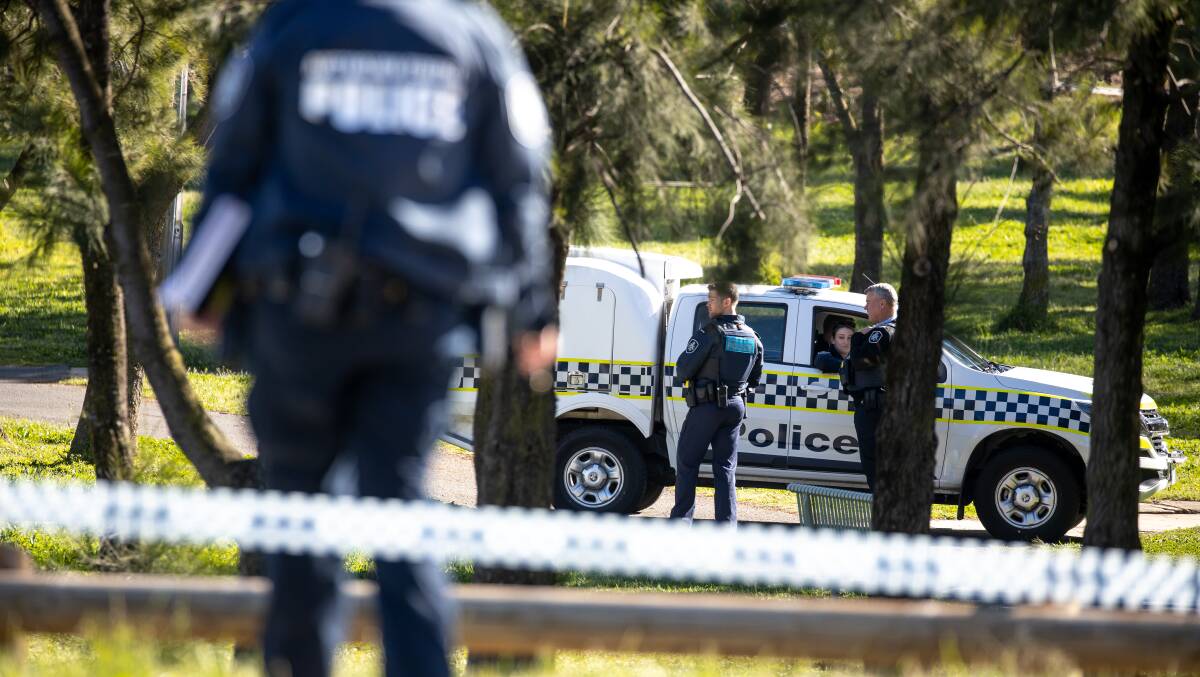 Police cordon off an area where a young man was fatally stabbed in the early hours of Sunday morning. Picture: Sitthixay Ditthavong