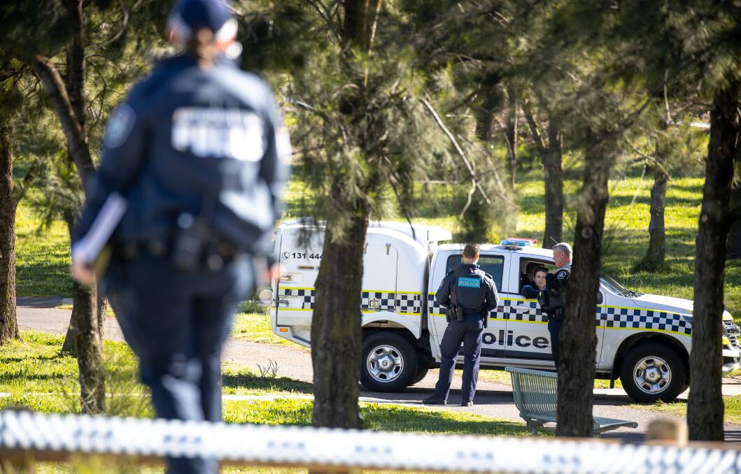 Police cordoned off the area where a young man was fatally stabbed in September. Picture: Sitthixay Ditthavong