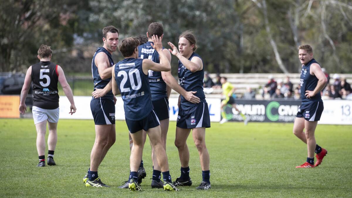 The Magpies celebrate one of Sam Glyde's seven goals. Picture: Sitthixay Ditthavong