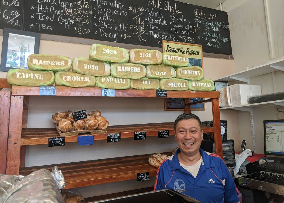 Vina Bakehouse and Coffee Shop owner Quan Nguyen with his Raiders bread.