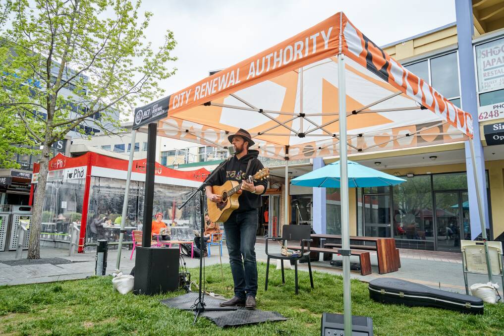  CJ Shaw performing in Garema Place on Wednesday as part of the City Renewal Authority's Lunchtime Acoustics program. Picture: Matt Loxton