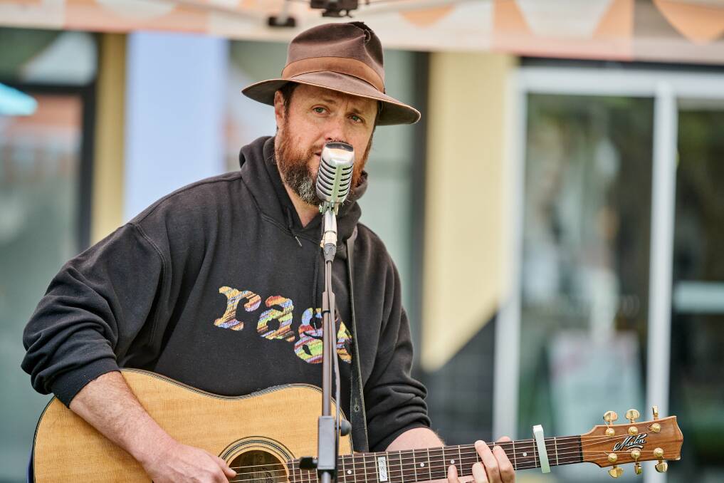 Canberra teacher CJ Shaw performing at Garema Place on Wednesday. Picture: Matt Loxton