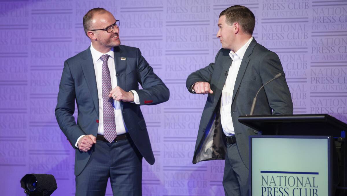 ACT Chief Minister Andrew Barr and Opposition Leader Alistair Coe exchange greetings at the conclusion of the ACT Leaders' Debate. Picture: Sitthixay Ditthavong.